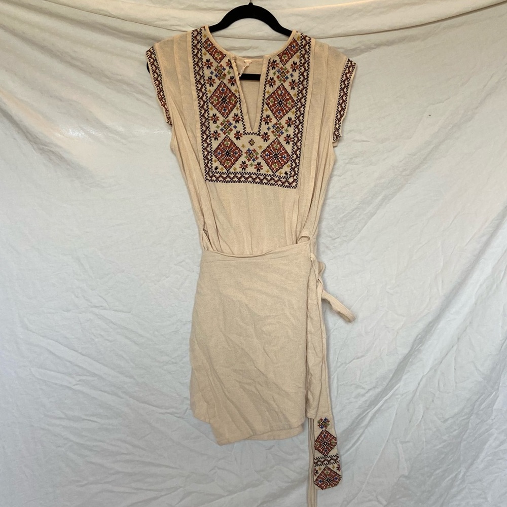 Free people embroidered wrap dress.